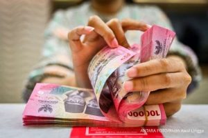 Rupiah Hari Ini Diprediksi Melemah hingga Rp 16.380 per Dolar AS